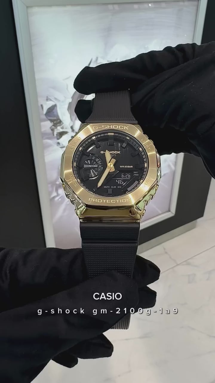 GM-2100 GOLD BLACK DIAL METAL BODY